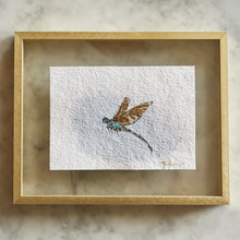 Load image into Gallery viewer, One of a kind artwork incorporating found dragonfly wing, gold leaf, watercolor paint, ink on archival cold press 5x7 watercolor paper, shown framed